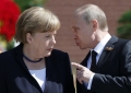 Putin si Merkel au discutat despre o productie comuna de vaccinuri