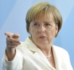 ANGELA MERKEL ÎI CERE LUI VIKTOR IANUKOVICI SĂ RETRAGĂ LEGILE CARE LIMITEAZĂ DREPTUL LA MANIFESTAŢII